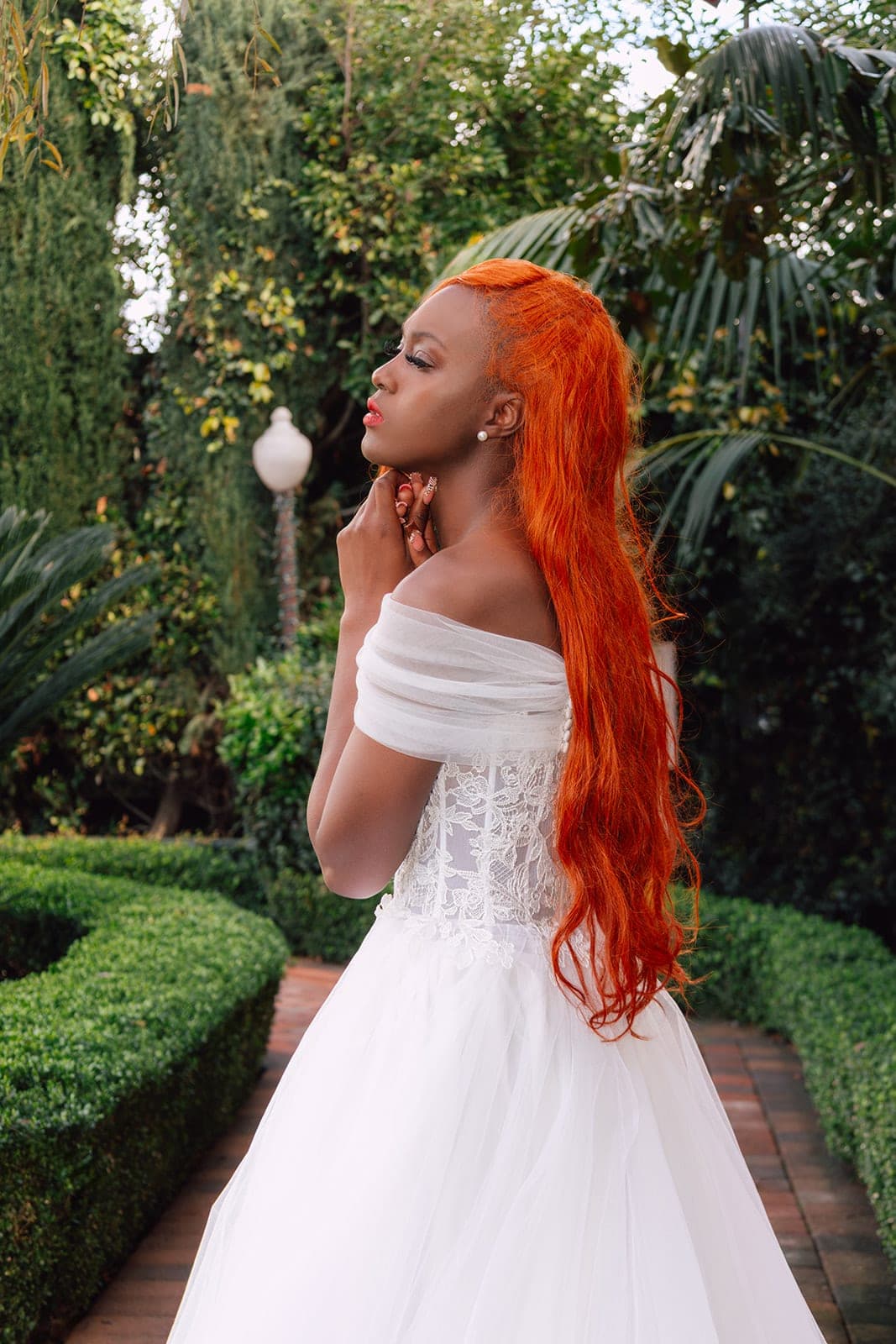 The Valentina lace corset tulle ballgown, side view