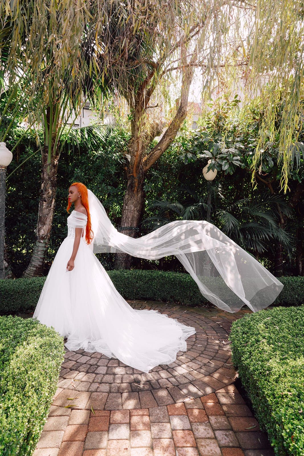 Side view of the Valentina off-shoulder tulle wedding dress